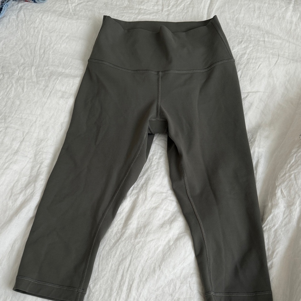 Lululemon 23” crop leggings, khaki color, internal pocket, like new! Size 4